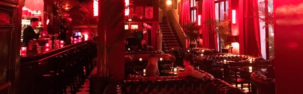 A Paris restaurant glowing red inside